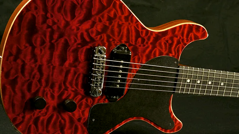 Deep red quilted-maple single-cut guitar